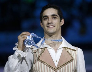 Silver medallist Javier Fernandez of Spain poses with the silver medal during the award ceremony after the men's final skating competition at the ISU Grand Prix of Figure Skating final in Barcelona